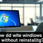 alt_text: Person at desk with laptop showing Windows 7, cleaning tools, tech icons, and troubleshooting text.